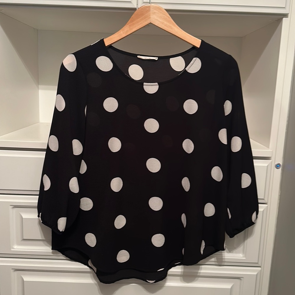 Le Lis women’s black blouse with large white polka dots